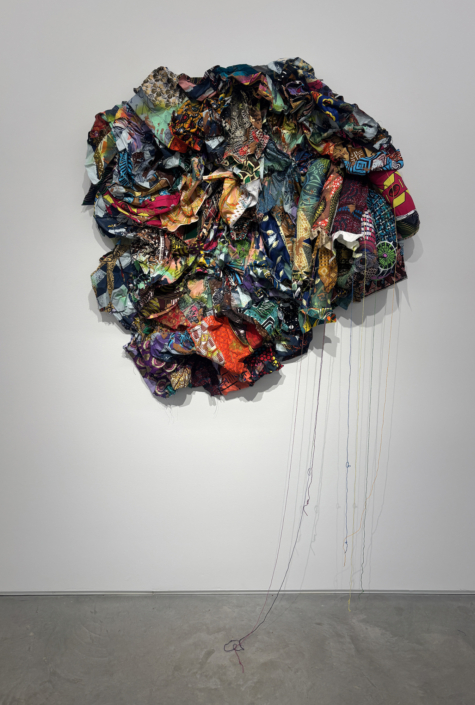 Jamele Wright Sr., Levitate 19, 2025, Mixed media; Georgia red clay, dutch wax cloth, 48″ x 48″ x 9″